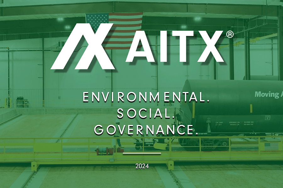 AITX logo with an American flag in the background, showcasing a warehouse environment focused on Environmental, Social, and Governance (ESG) principles for 2024.
