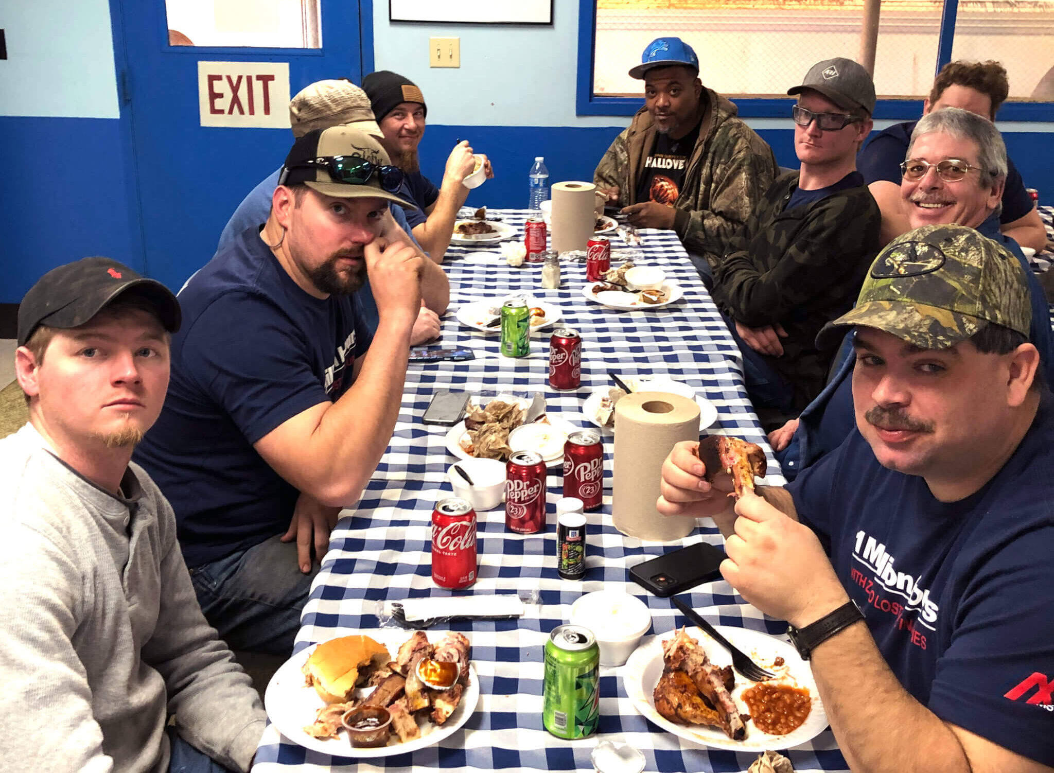 Group of employees celebrating safety milestone with a meal, showcasing camaraderie and teamwork in Bude, MS, after achieving over 1 million hours with zero lost time to injuries.